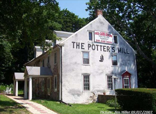 picture by Jim Miller (09/07/07): A 35'X 55' stone/stucco mill dating from 1735 and standing 3.5 stories in height.